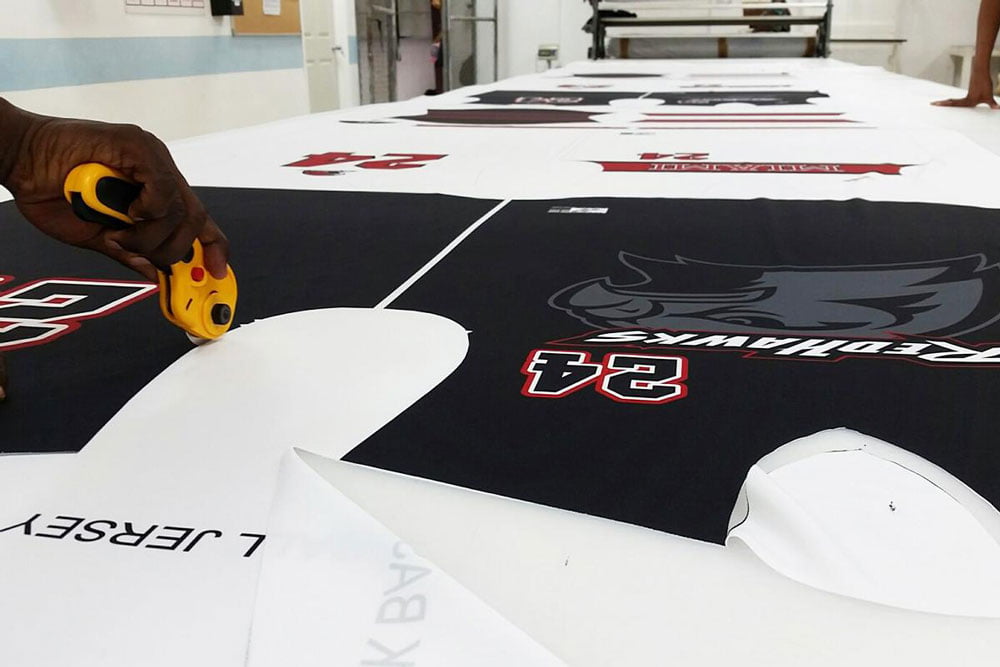 Cutting out a sublimated tee
